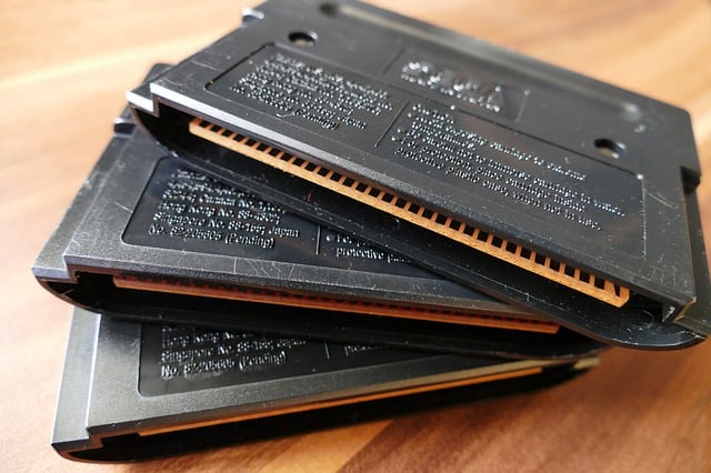 Three Sega Genesis (Mega Drive) game cartridges